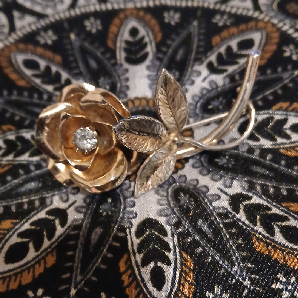 Elegant Gold and Silver Floral Brooch